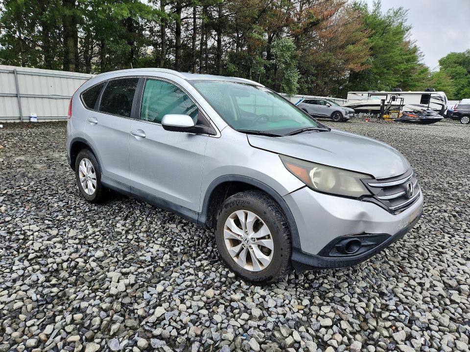 Photo 4 from auction – 2013 HONDA CR-V with VIN 2HKRM4H77DH669749