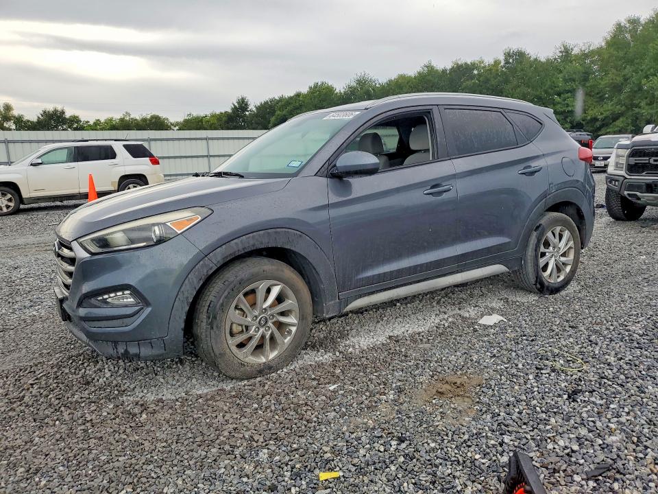 HYUNDAI TUCSON 2018 with VIN KM8J3CA41JU676168 - Photo from auction