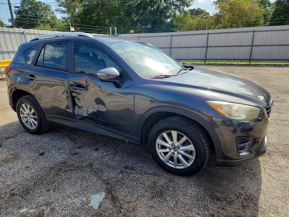 Photo 4 from auction – 2016 MAZDA CX-5 with VIN JM3KE2BY5G0692265