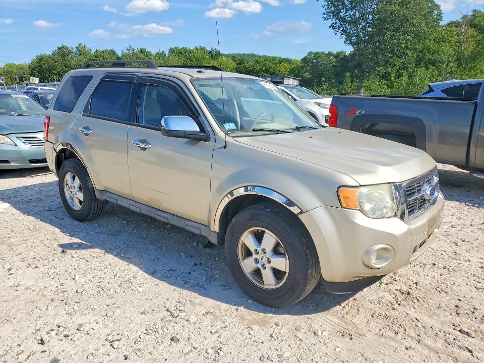 Photo 4 from auction – 2010 FORD ESCAPE with VIN 1FMCU9D78AKC04950