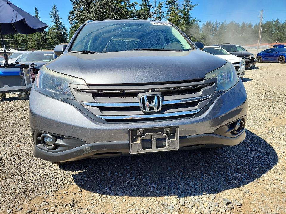 Photo 5 from auction – 2014 HONDA CR-V with VIN 2HKRM4H78EH631643