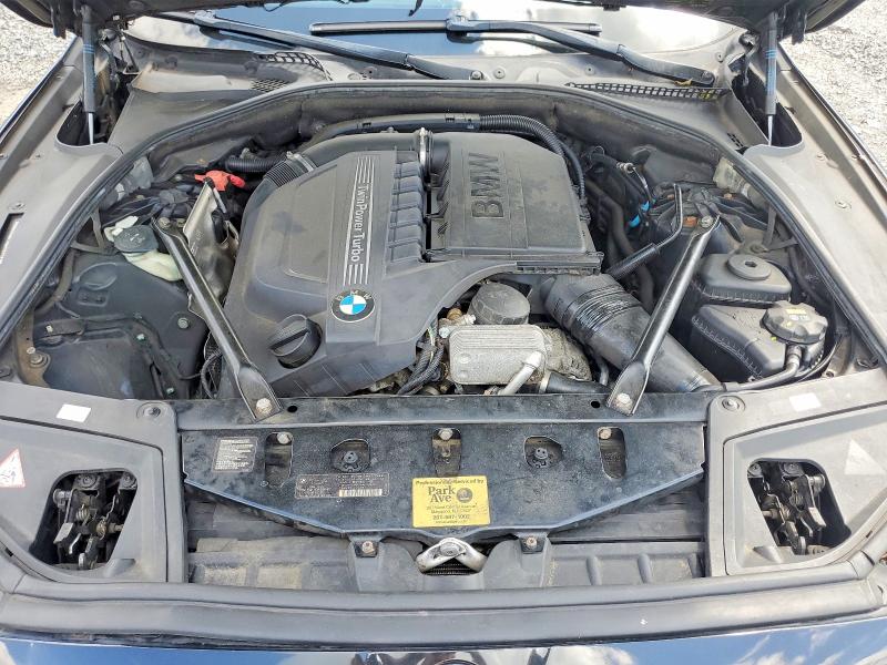 Photo 11 from auction – 2014 BMW 5 SERIES with VIN WBA5B3C50ED539109