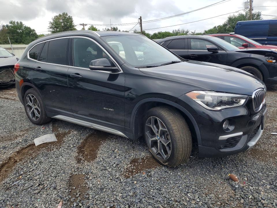 Photo 4 from auction – 2017 BMW X1 with VIN WBXHT3Z34H4A55974