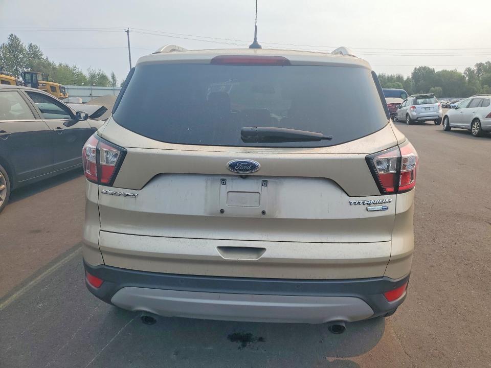 Photo 6 from auction – 2018 FORD ESCAPE with VIN 1FMCU9J90JUC89406