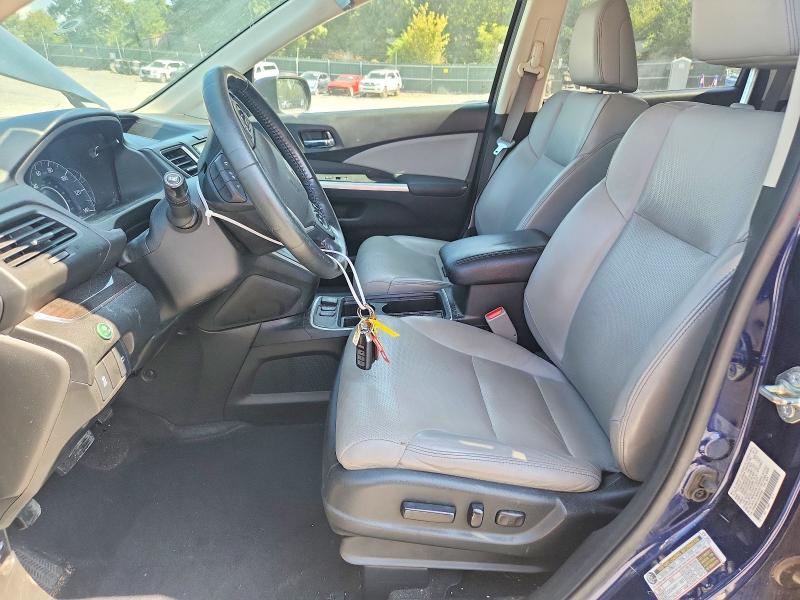 Photo 7 from auction – 2015 HONDA CR-V with VIN 2HKRM4H73FH655995