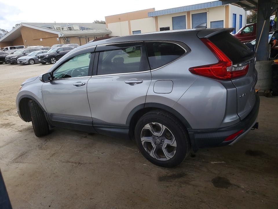 Photo 2 from auction – 2018 HONDA CR-V with VIN 7FARW2H86JE015296