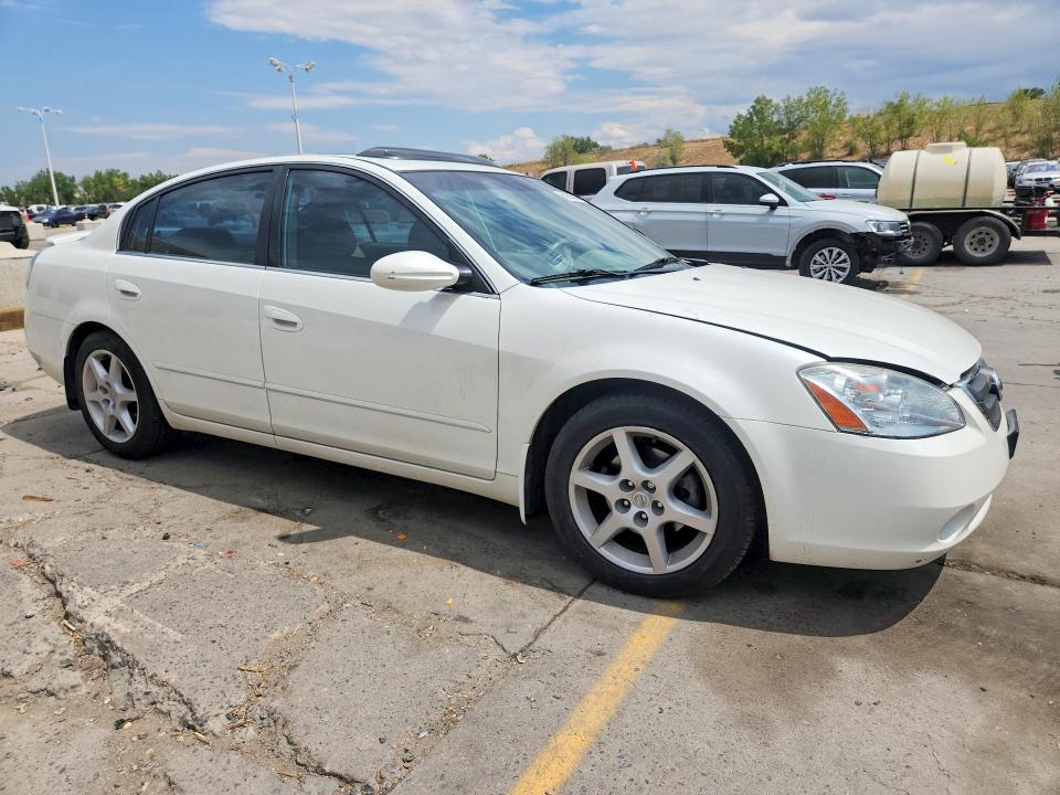 Photo 4 from auction – 2002 NISSAN ALTIMA with VIN 1N4BL11D02C161088