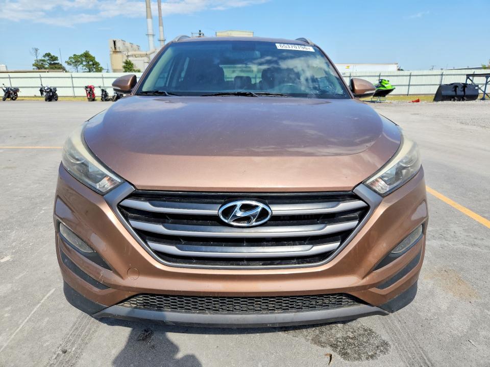 Photo 5 from auction – 2016 HYUNDAI TUCSON with VIN KM8J3CA29GU112937