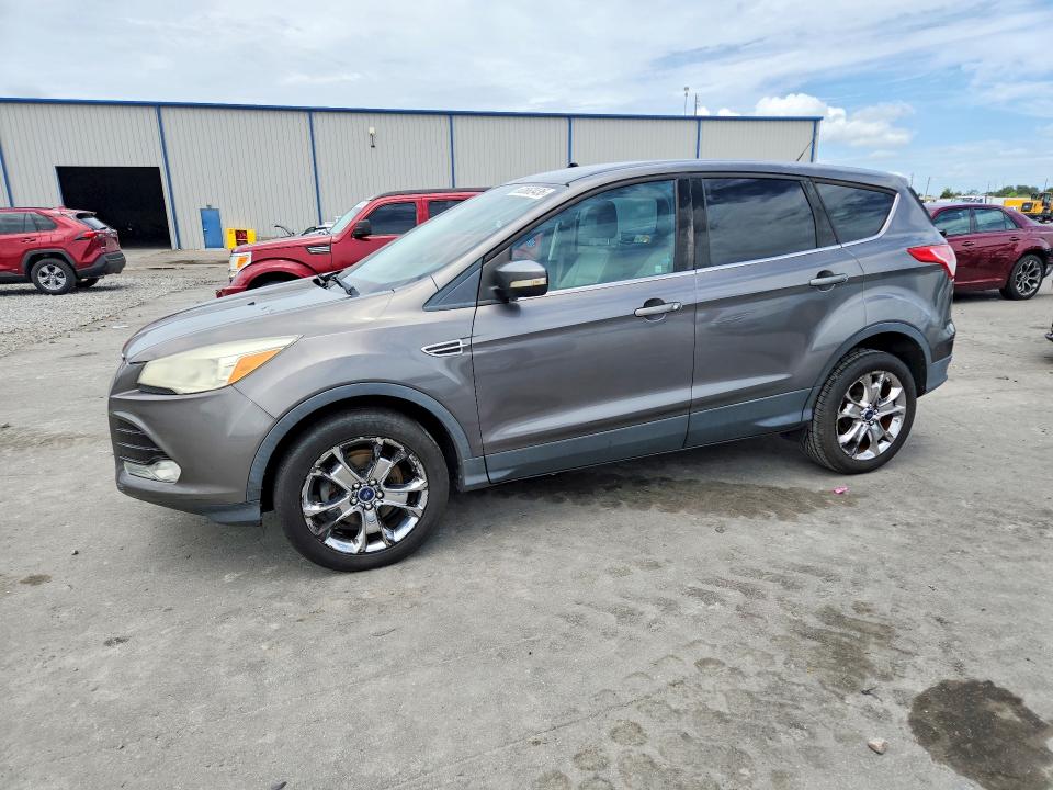 FORD ESCAPE 2013 with VIN 1FMCU0HX8DUD49128 - Photo from auction
