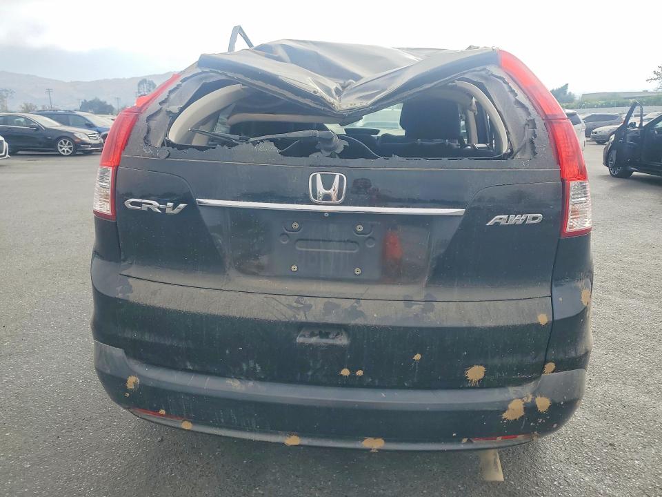 Photo 6 from auction – 2014 HONDA CR-V with VIN 5J6RM4H59EL000145