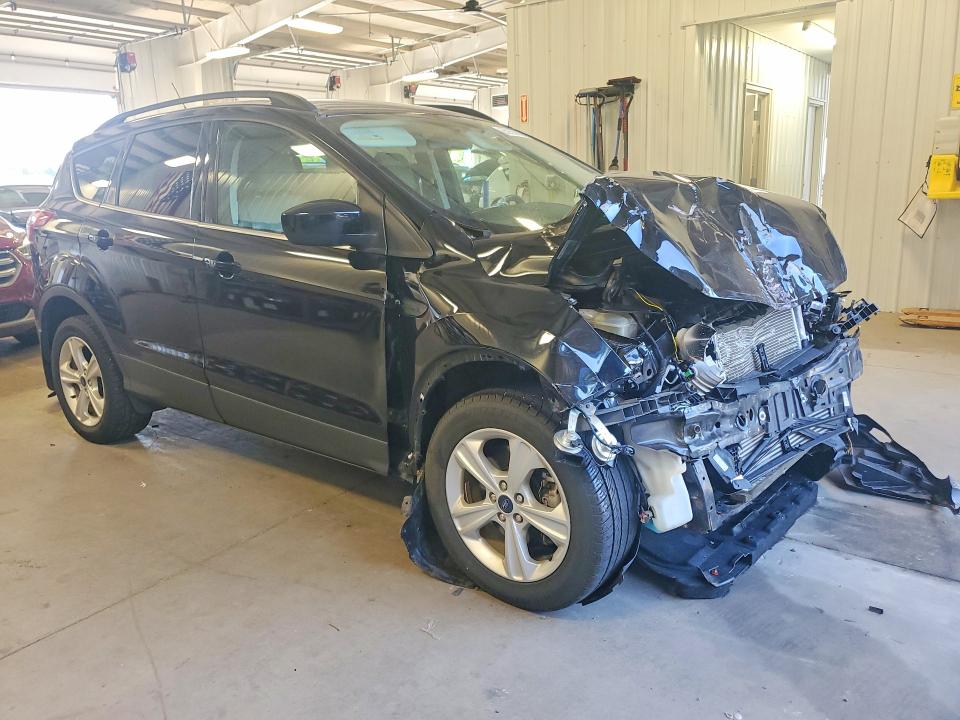 Photo 4 from auction – 2016 FORD ESCAPE with VIN 1FMCU9GX7GUC43621