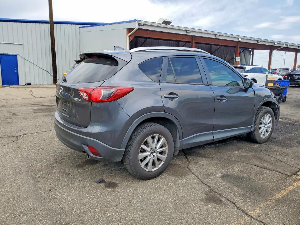 Photo 3 from auction – 2016 MAZDA CX-5 with VIN JM3KE4CY8G0826938