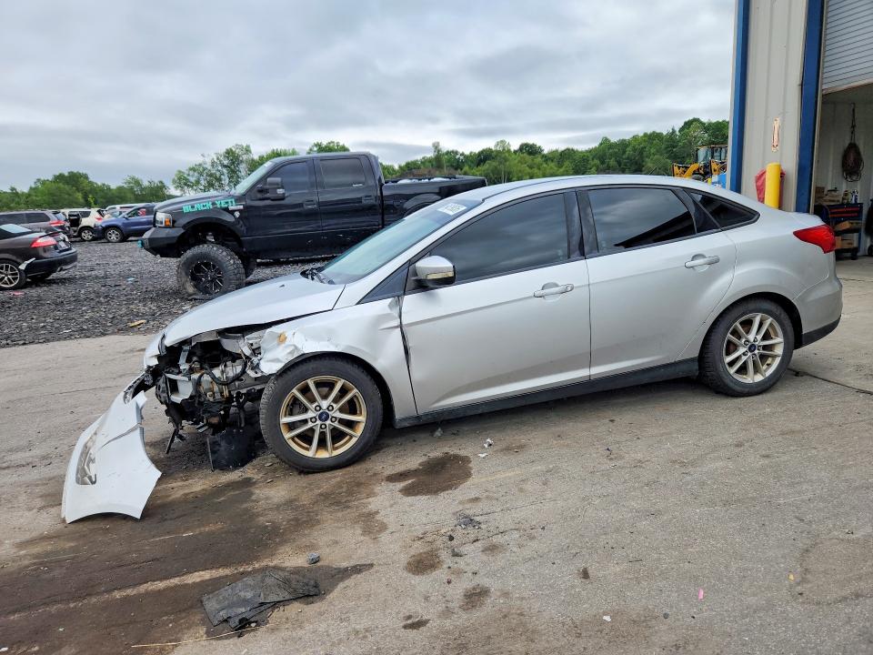 FORD FOCUS 2016 with VIN 1FADP3F23GL381316 - Photo from auction