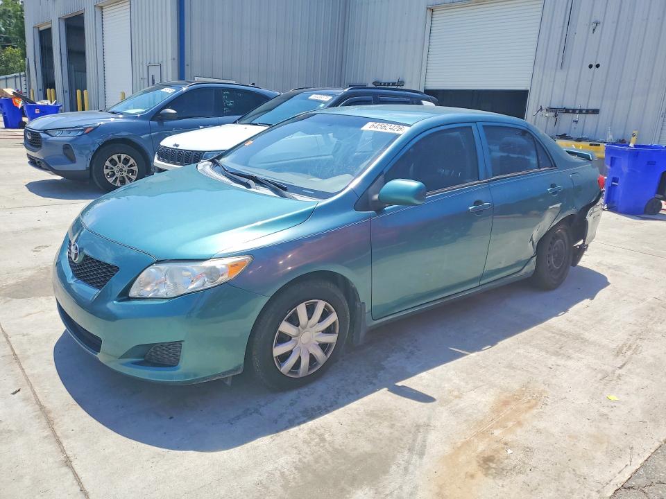 TOYOTA COROLLA 2010 with VIN 2T1BU4EE0AC387679 - Photo from auction