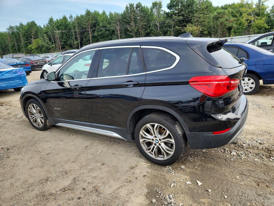 Foto 2 de la subasta – 2016 BMW X1 con VIN WBXHT3Z34G4A47694