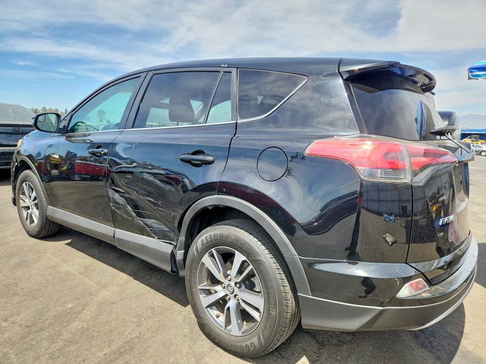 Photo 2 from auction – 2018 TOYOTA RAV4 with VIN 2T3WFREV1JW436760