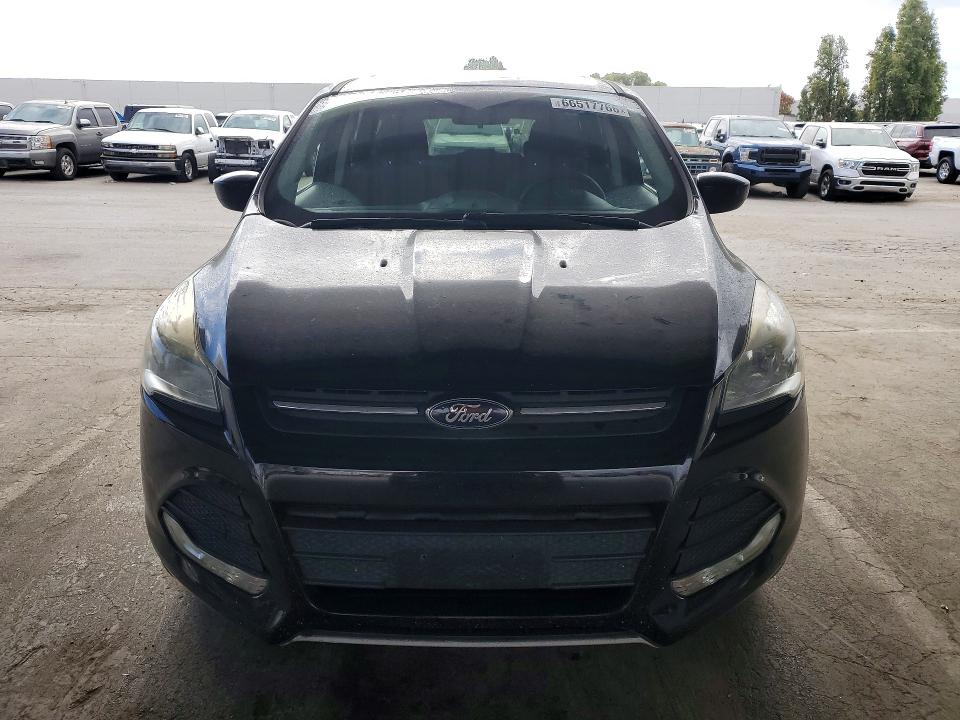 Photo 5 from auction – 2016 FORD ESCAPE with VIN 1FMCU9GX4GUB61281