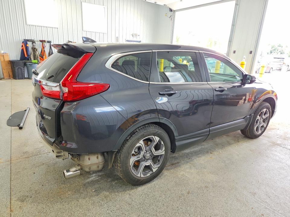 Photo 3 from auction – 2018 HONDA CR-V with VIN 2HKRW2H84JH615442