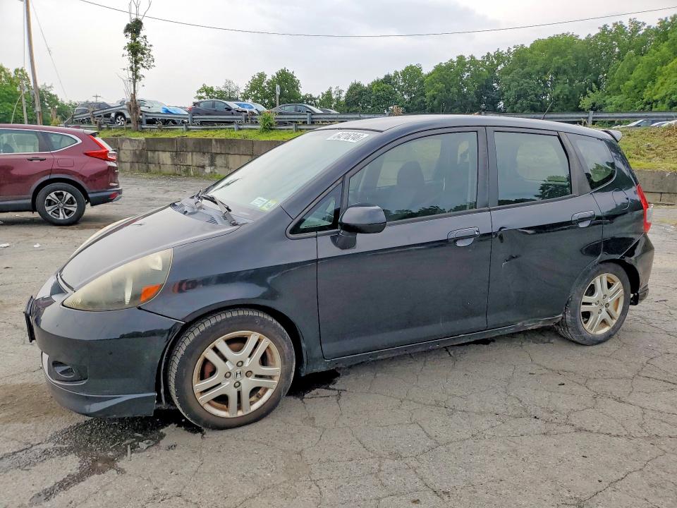 HONDA FIT 2007 with VIN JHMGD37647S054896 - Photo from auction