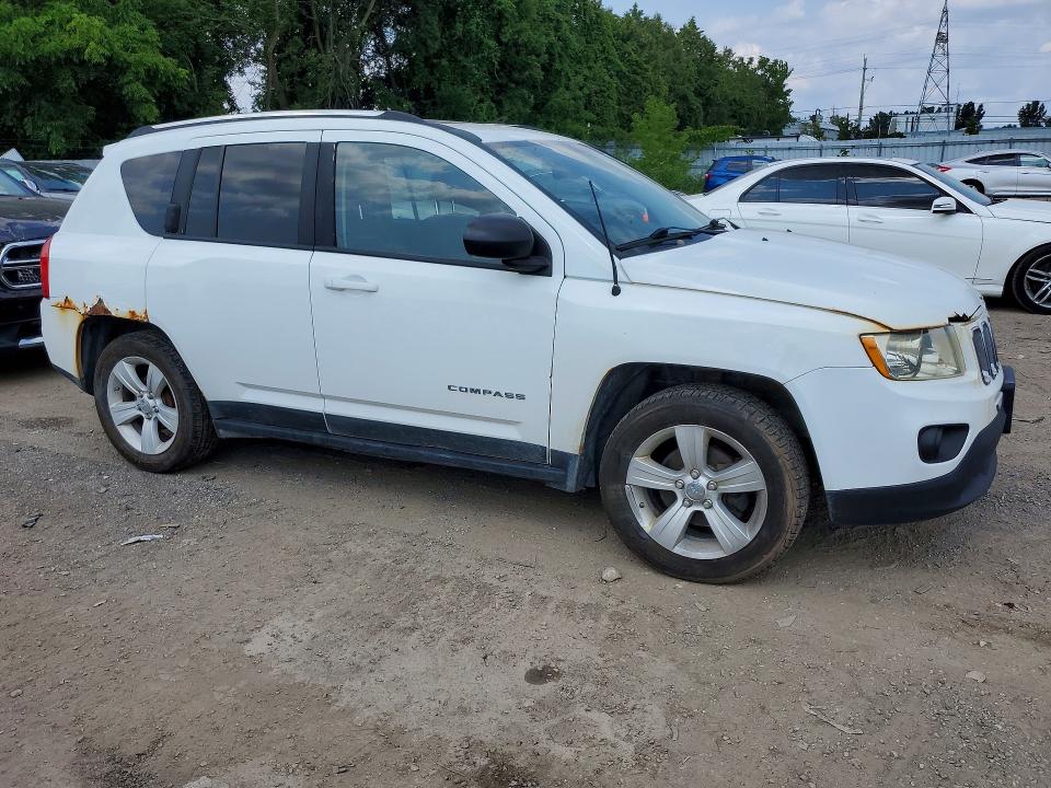 Photo 4 from auction – 2011 JEEP COMPASS with VIN 1J4NT4FB7BD284603