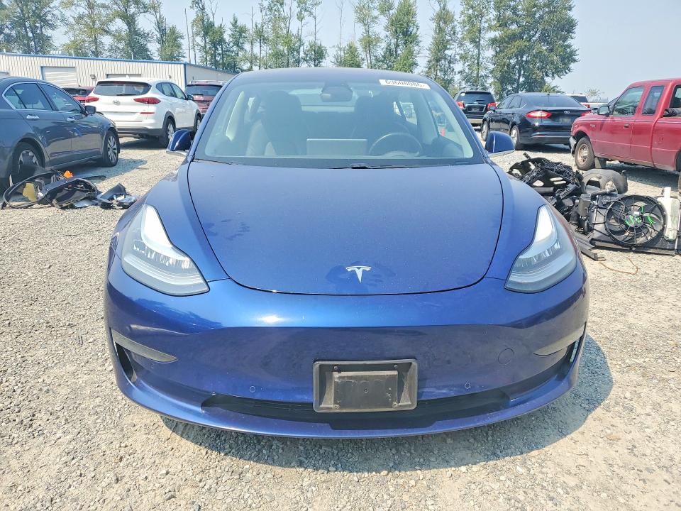 Photo 5 from auction – 2018 TESLA MODEL 3 with VIN 5YJ3E1EA1JF076013
