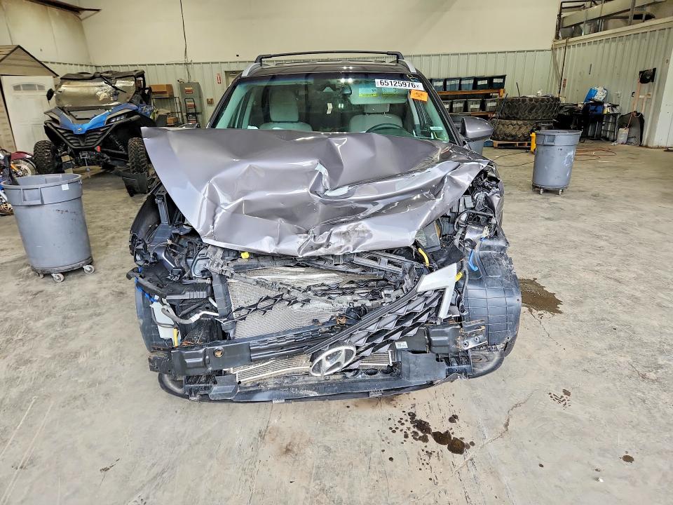 Photo 5 from auction – 2021 HYUNDAI TUCSON with VIN KM8J3CA41MU335146