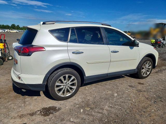 Photo 3 from auction – 2018 TOYOTA RAV4 with VIN 2T3DFREV8JW696127