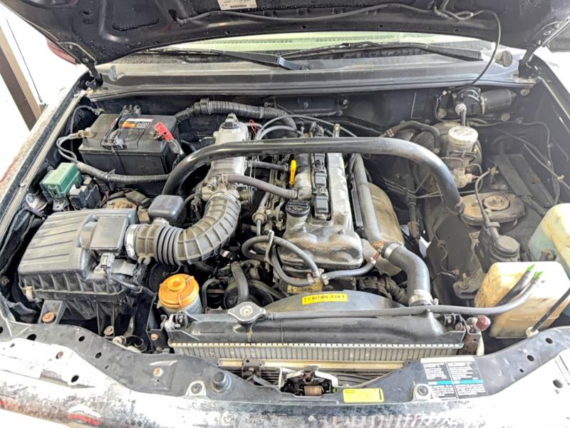 Photo 7 from auction – 2003 CHEVROLET TRACKER with VIN 2CNBE18C736925171