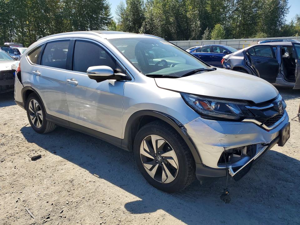 Photo 4 from auction – 2015 HONDA CR-V with VIN 5J6RM4H90FL111865