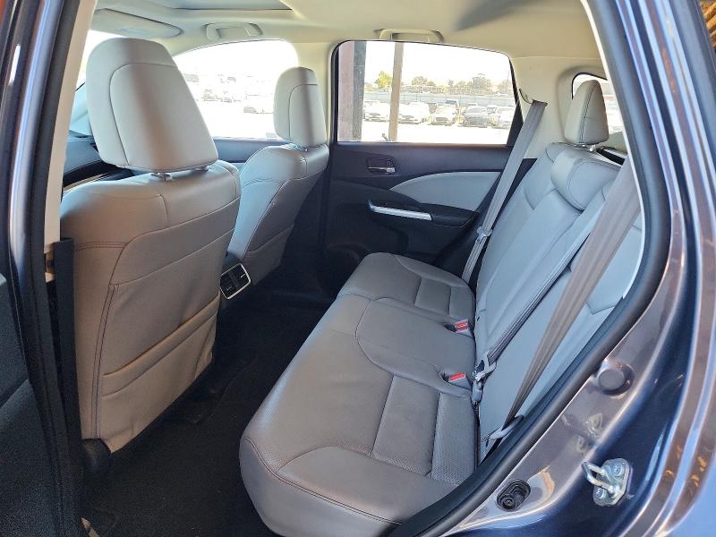 Photo 11 from auction – 2016 HONDA CR-V with VIN 5J6RM3H70GL023442