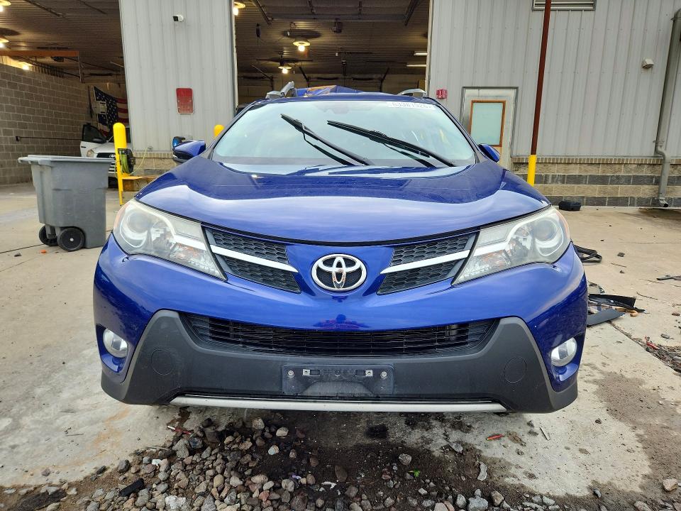 Photo 5 from auction – 2015 TOYOTA RAV4 with VIN 2T3DFREV9FW327865