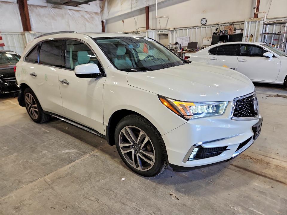 Снимка 4 от търг – 2017 ACURA MDX с VIN 5FRYD4H80HB029566