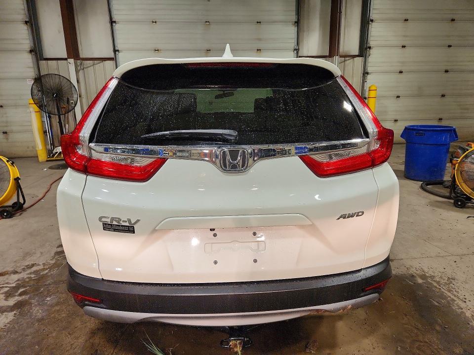 Photo 6 from auction – 2017 HONDA CR-V with VIN 5J6RW2H5XHL041824
