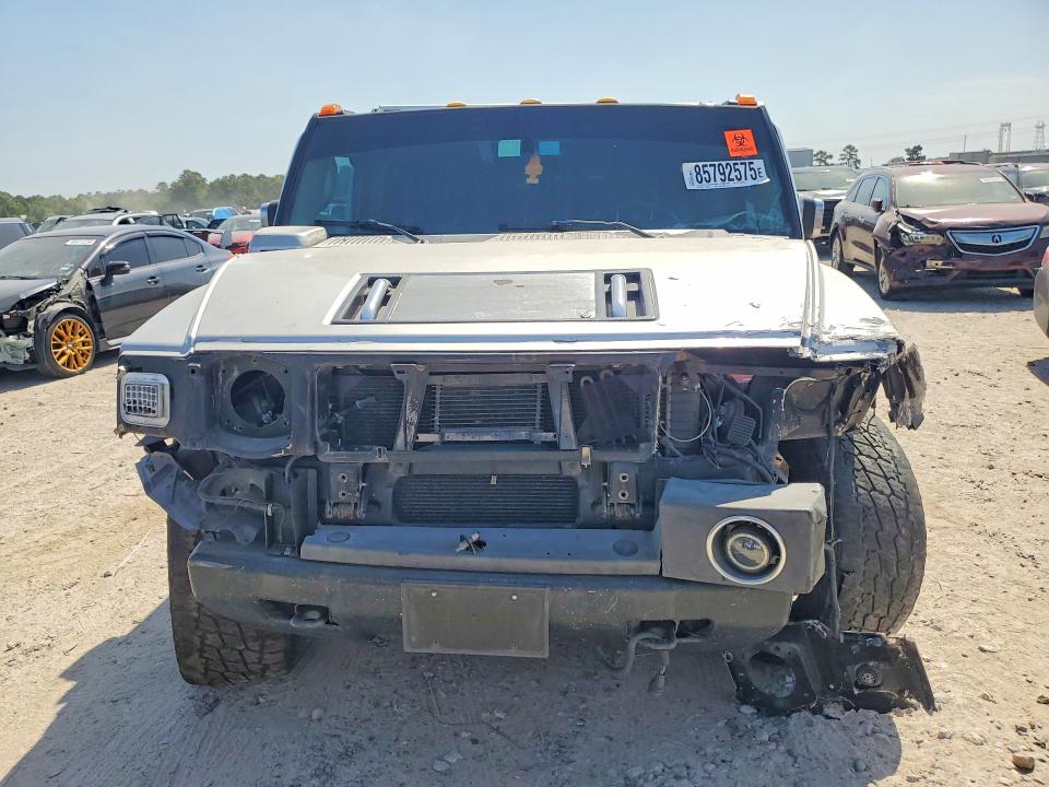Фото 5 с аукциона – 2003 HUMMER H2 с VIN 5GRGN23U03H134649
