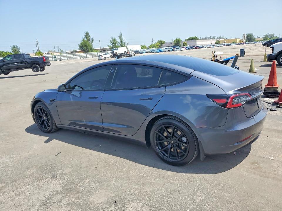 Photo 2 from auction – 2021 TESLA MODEL 3 with VIN 5YJ3E1EA8MF854022