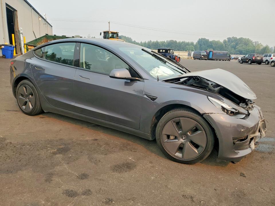 Photo 4 from auction – 2023 TESLA MODEL 3 with VIN 5YJ3E1EA5PF687039