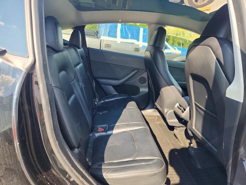 Photo 10 from auction – 2023 TESLA MODEL Y with VIN 7SAYGDEE4PA052527