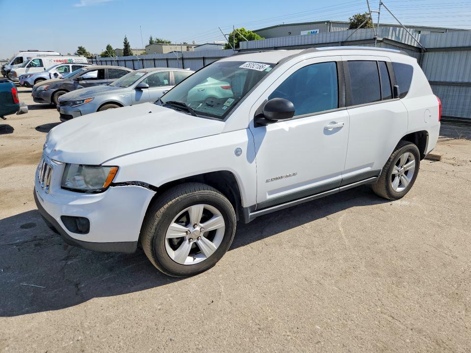 JEEP COMPASS 2011 with VIN 1J4NF1FB2BD201679 - Photo from auction