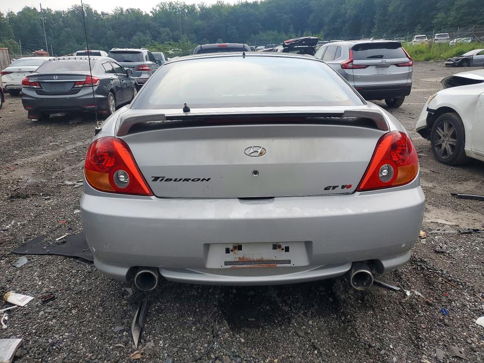 Photo 6 from auction – 2003 HYUNDAI TIBURON with VIN KMHHN65F33U013208