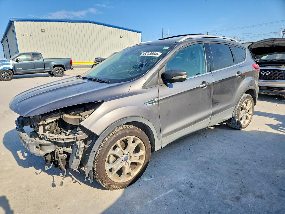 FORD ESCAPE 2014 with VIN 1FMCU0JX4EUB97473 - Photo from auction