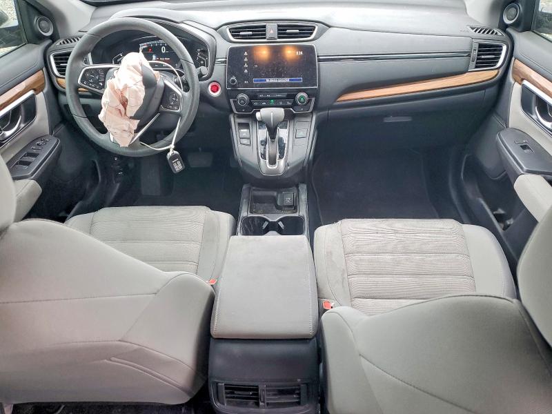 Photo 8 from auction – 2018 HONDA CR-V with VIN 7FARW1H52JE026358
