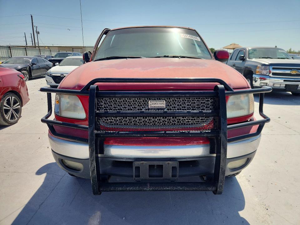 Photo 5 from auction – 1999 FORD F150 with VIN 1FTRX18L0XKB98343