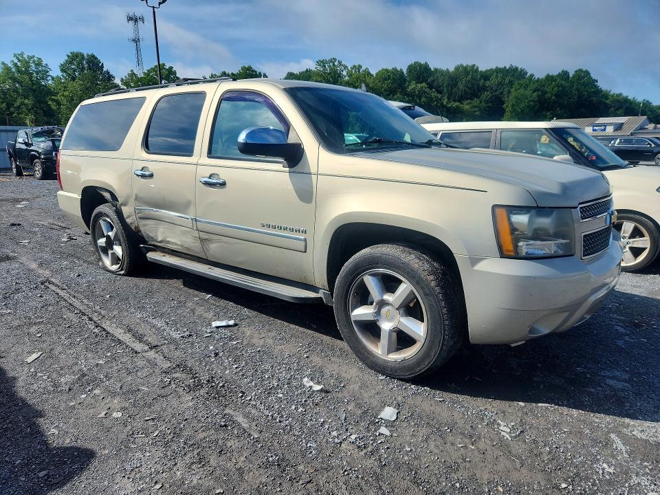 Photo 4 from auction – 2011 CHEVROLET SUBURBAN with VIN 1GNSKKE3XBR365812