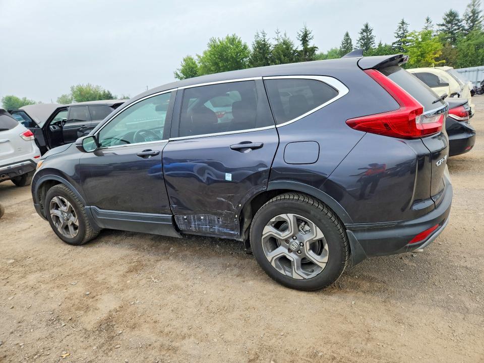 Photo 2 from auction – 2018 HONDA CR-V with VIN 2HKRW2H80JH107386