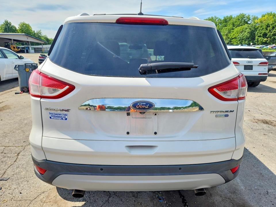 Photo 6 from auction – 2014 FORD ESCAPE with VIN 1FMCU9JX7EUB75469