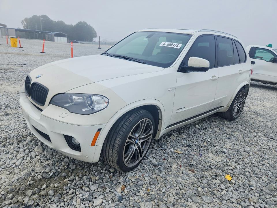 BMW X5 2013 with VIN 5UXZV8C54D0C14978 - Photo from auction