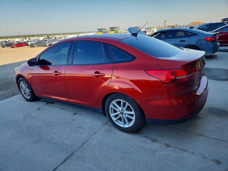 Снимка 2 от търг – 2018 FORD FOCUS с VIN 1FADP3F24JL259670
