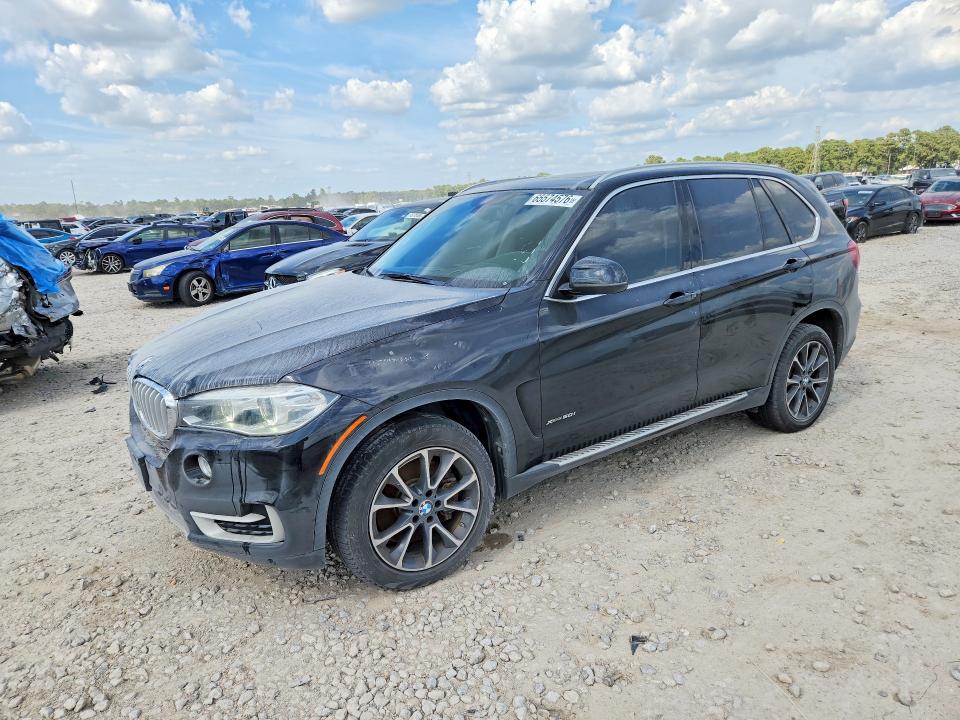 BMW X5 2014 with VIN 5UXKR6C5XE0C02264 - Photo from auction