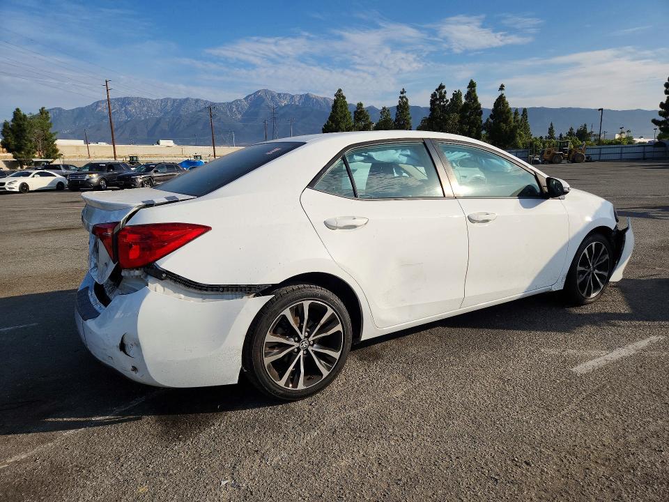 Photo 3 from auction – 2017 TOYOTA COROLLA with VIN 5YFBURHE7HP677758