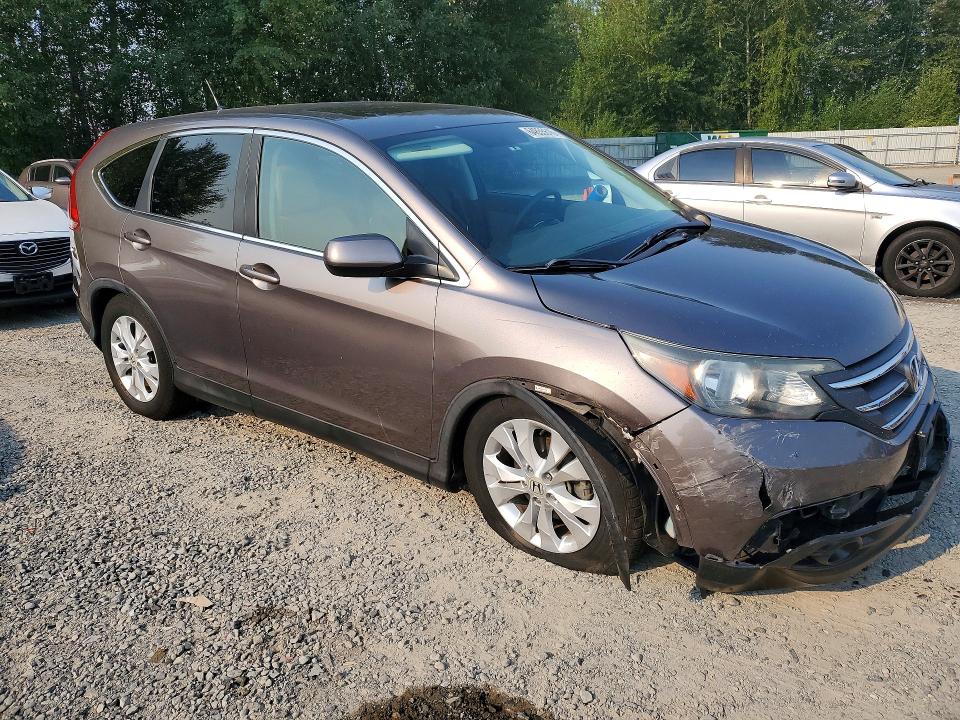 Photo 4 from auction – 2014 HONDA CR-V with VIN 5J6RM4H5XEL076408